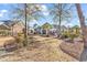 Spacious backyard featuring a well-manicured lawn and an outdoor patio, ideal for entertaining and relaxing at 120 Henry Middleton Blvd., Myrtle Beach, SC 29588
