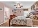 Tranquil bedroom connected to a bathroom, featuring a tropical theme and natural light for a serene retreat at 120 Henry Middleton Blvd., Myrtle Beach, SC 29588