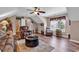 Spacious living room with hardwood floors, comfortable seating, and ample natural light for a welcoming space at 120 Henry Middleton Blvd., Myrtle Beach, SC 29588