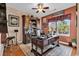 Inviting home office with a large wooden desk, built-in bookcase, and a window overlooking the backyard at 120 Henry Middleton Blvd., Myrtle Beach, SC 29588