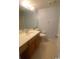 Bathroom features a toilet, single sink, and vanity with storage at 1200 5Th Ave. N # 1407, Surfside Beach, SC 29575