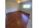 Bedroom with laminated wood floors and natural light at 1200 5Th Ave. N # 1407, Surfside Beach, SC 29575