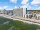 Aerial view of a beachfront condos with ocean views at 1210 N Waccamaw Dr. # 212, Garden City Beach, SC 29576