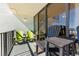 Cozy balcony featuring stylish Adirondack chairs and ocean views at 1210 N Waccamaw Dr. # 212, Garden City Beach, SC 29576