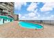 Sparkling outdoor pool overlooking the ocean at 1210 N Waccamaw Dr. # 212, Garden City Beach, SC 29576