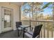 Private balcony with seating area, perfect for enjoying the outdoors at 1220 River Oak Dr. # 22C, Myrtle Beach, SC 29579