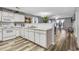 Well-lit kitchen area that features ample countertop space, and modern appliances at 1220 River Oak Dr. # 22C, Myrtle Beach, SC 29579