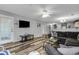 Comfortable living room featuring wood-look flooring and plenty of natural light at 1220 River Oak Dr. # 22C, Myrtle Beach, SC 29579