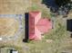 Aerial view of the home showing roof, yard, and circular driveway on a spacious lot at 1301 Highway 701 South, Loris, SC 29569