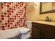 Bathroom features a vanity with a dark cabinet, a sink and shower with a decorative curtain at 1301 Pridgen Rd. # 1101, Myrtle Beach, SC 29577