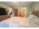 View of the room showing the bed, dresser, closet, and entry into the bathroom at 1301 Pridgen Rd. # 1101, Myrtle Beach, SC 29577