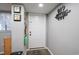Hallway with a white front door and decor on the wall at 1301 Pridgen Rd. # 1101, Myrtle Beach, SC 29577