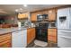 Well-equipped kitchen with stainless steel appliances, tile backsplash, and granite countertops at 1301 Pridgen Rd. # 1101, Myrtle Beach, SC 29577