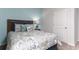 Cozy bedroom featuring a rattan headboard and floral-patterned bedding at 1451 Porchfield Dr., Conway, SC 29526