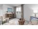 Welcoming living room with neutral furniture, patterned rug, and large window at 1451 Porchfield Dr., Conway, SC 29526