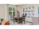 Well-lit dining room showcasing a modern table set and palette of neutral tones at 1459 Porchfield Dr., Conway, SC 29526