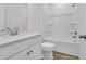 Well-lit bathroom with a combined shower and tub, and a modern vanity at 155 Joyce Dr, Longs, SC 29568