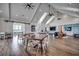 Spacious clubhouse shows a modern design with high ceilings, tables, and wood floors at 1587 Sayebrook Pkwy., Myrtle Beach, SC 29588