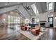 Bright community clubhouse boasts vaulted ceilings, fireplace, seating, and rustic wood floors at 1587 Sayebrook Pkwy., Myrtle Beach, SC 29588