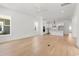 Bright open-concept living space with hardwood floors seamlessly flowing into the modern kitchen at 1587 Sayebrook Pkwy., Myrtle Beach, SC 29588