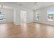 Bright and airy open floor plan featuring hardwood floors, white walls, and natural light at 1587 Sayebrook Pkwy., Myrtle Beach, SC 29588