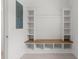 Organized mudroom features open shelves, built-in bench with storage, and shiplap accent wall at 1587 Sayebrook Pkwy., Myrtle Beach, SC 29588