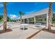 Outdoor community pavilion with tables and ceiling fans overlooks the pool at 1587 Sayebrook Pkwy., Myrtle Beach, SC 29588