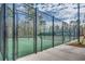 A view of the community pickle ball court, enclosed by a fence at 1587 Sayebrook Pkwy., Myrtle Beach, SC 29588
