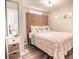 Relaxing bedroom featuring marine-themed decor, a woven headboard, and a white nightstand at 1733 Neptune Rd., Myrtle Beach, SC 29575