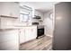 Well-equipped kitchen featuring white cabinets, stainless steel appliances and modern finishes at 1733 Neptune Rd., Myrtle Beach, SC 29575