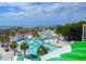 Community waterpark featuring twisting lazy river, palms, splash zone, and views of the ocean at 1733 Neptune Rd., Myrtle Beach, SC 29575