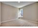 Neutral bedroom with carpeted floors and a window allowing for natural light at 179 Glengrove Lane, Murrells Inlet, SC 29576