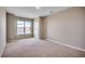 Spacious bedroom with a scenic view, plush carpet, and a soothing atmosphere at 179 Glengrove Lane, Murrells Inlet, SC 29576
