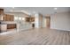 Open-concept kitchen featuring an island, stainless appliances, and hardwood floors at 179 Glengrove Lane, Murrells Inlet, SC 29576