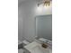 Bathroom featuring white countertop, toilet, and tile tub at 180 Glengrove Lane, Murrells Inlet, SC 29576