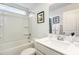 Clean, well-lit bathroom features a shower-tub combo and vanity with ample counter space at 1813 Brook Park Pl., Conway, SC 29526