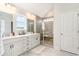 Modern bathroom with double vanity, walk-in shower featuring a glass enclosure, and contemporary fixtures at 1813 Brook Park Pl., Conway, SC 29526
