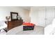 Bedroom featuring a dresser with dark wood finish, neutral decor, and plush bedding for a serene retreat at 1813 Brook Park Pl., Conway, SC 29526
