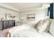 Serene bedroom featuring a tray ceiling, neutral decor, plush bedding, and ample natural light for a relaxing retreat at 1813 Brook Park Pl., Conway, SC 29526