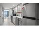 Modern kitchen with white cabinets, stainless steel appliances and countertop space at 2000 N Ocean Blvd. # 1509, Myrtle Beach, SC 29577