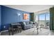 Cozy living room with water view, tasteful art, and a comfortable couch at 2000 N Ocean Blvd. # 1509, Myrtle Beach, SC 29577
