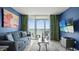 Comfortable living room with ocean view, stylish decor, and a flat screen television at 2000 N Ocean Blvd. # 1509, Myrtle Beach, SC 29577