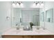 Bathroom with double vanity sinks, and large mirror at 2049 Oxford St., Myrtle Beach, SC 29577