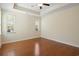 Open bedroom with hardwood floors and natural light from the multiple windows at 2049 Oxford St., Myrtle Beach, SC 29577
