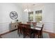 Dining room featuring hardwood floors and a modern chandelier at 2049 Oxford St., Myrtle Beach, SC 29577