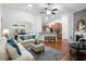 Open-concept living room with vaulted ceilings, hardwood floors, and seamless flow to the kitchen at 2049 Oxford St., Myrtle Beach, SC 29577