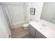 Well-lit bathroom with vanity, shower-tub combo and modern fixtures at 212 Jeff Waters Circle, Longs, SC 29568
