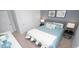 Well-lit bedroom with a soft color scheme, stylish décor, and comfortable furnishings at 212 Jeff Waters Circle, Longs, SC 29568
