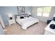 Inviting bedroom with accent wall, natural lighting, and coordinating decor for peaceful sleep at 212 Jeff Waters Circle, Longs, SC 29568