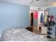 Bedroom featuring a queen size bed, dresser, and closet with convenient access to bedroom at 2257 Huntingdon Dr. # F, Surfside Beach, SC 29575